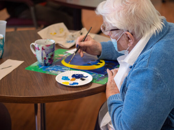 Participant painting home health care provider